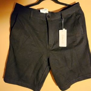 Black cotton flat front size 32 shorts